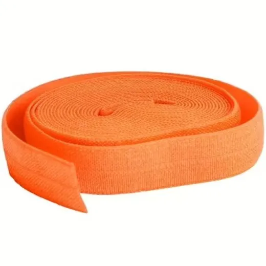 Fold-Over-Elastic Pumpkin – Rolle freigestellt Aufgerolltes ByAnnie's Fold-Over-Elastic in Pumpkin, freigestellt auf weißem Hintergrund