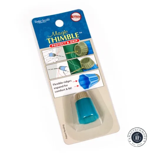 Verpackung des Taylor Seville Magic Thimble in Blau, schräg fotografiert mit Anwendungsgrafiken