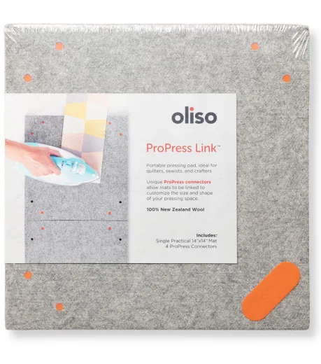 Oliso Wool Pressing MultiMat in der Original-Verpackung mit Produktbeschreibung und Anwendungsfoto