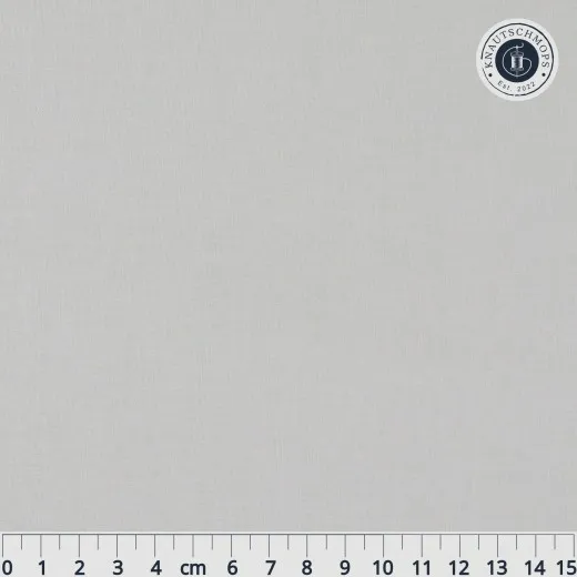Flach ausgebreitetes Zen-Grey-Stoffmuster mit Zentimeter-Maßstab zur Größeneinordnung.