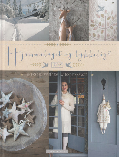 Tilda Buch Hjemmelaget og lykkelig von Tone Finnanger Buchcover Tilda Hjemmelaget og lykkelig von Tone Finnanger mit Stoffsternen, Rentieren und Winterdeko