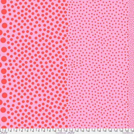 Tula Pink Stones Watermelon – Punktestoff in Rosa und Rot Tula Pink Stones Watermelon: rote Punkte auf rosa Baumwollstoff, Größenverlauf von groß nach fein, mit Zollmaßband