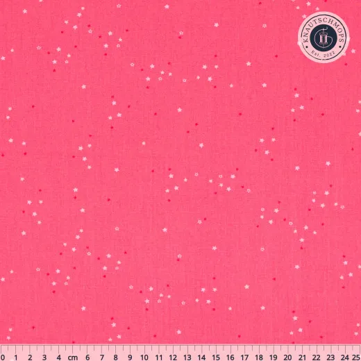 Twinkle little Stars Candy – Gesamtansicht mit Lineal Korallenfarbener Baumwollstoff mit funkelnden Sternen in Weiß, Rosa und Gold, Gesamtansicht mit Lineal