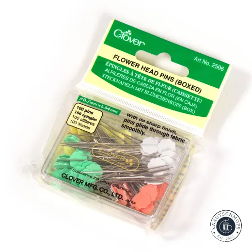 Verpackung mit Blütenkopf-Stecknadeln Clover Stecknadeln mit Blütenkopf in der Originalverpackung, leicht angeschrägt fotografiert.