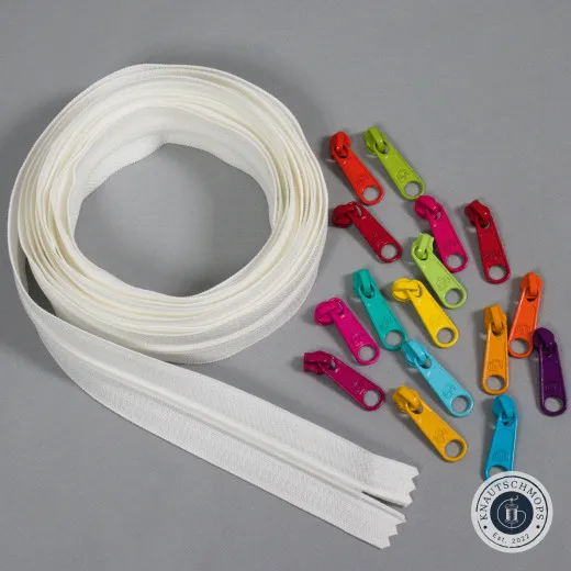 Zippers by the Yard – Gesamtansicht Aufgerolltes weißes ByAnnie's Reißverschlussband mit 16 bunten Zippern