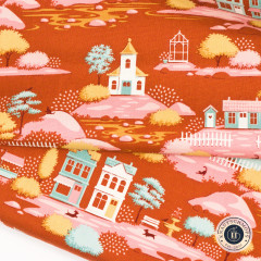 Gefalteter Tilda Stoff Village Rust mit Häusern, Kirche und Bäumen in Rost, Rosa und Mint