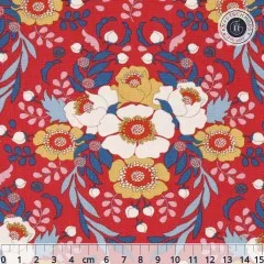 Tilda-Stoff Anemone in Red mit symmetrischem Blütenmuster in Weiß, Gelb und Blau auf rotem Fond, mit Zentimeter-Maßstab.