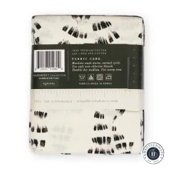 Rückseite der Banderole mit Barcode, Materialangabe Leinen-Baumwoll-Mix und Waschhinweisen.