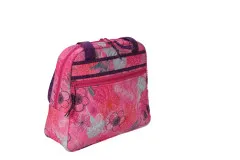 Seitenansicht der pinken Bowler-Tasche mit floralem Muster.