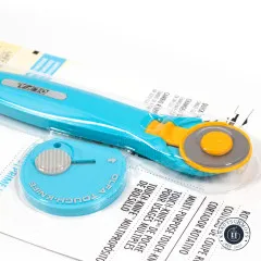 Nahaufnahme des Rollschneiderkopfs mit Schnellwechsel-Klinge und Touch-Knife-Bonus.