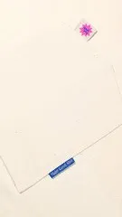 Labels „fuck yeah!" und „Make Good Shit" eingenäht in naturfarbenen Canvas-Stoff.