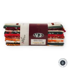 Alle 16 Fat Quarters in perspektivischer Fächeranordnung mit herbstlichen Motiven.
