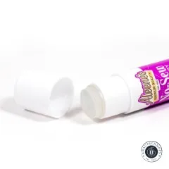Aleene's No-Sew Klebestift mit abgenommener Kappe, durchscheinende Klebemasse an der Stiftspitze sichtbar
