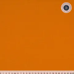 Oranger Unistoff Gingerbread flach ausgelegt mit Zentimeterlineal bis 25 cm