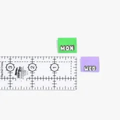 Die Label „Mon" und „Wed" auf einem Lineal zeigen die tatsächliche Labelgröße.