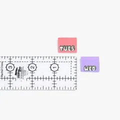 Die Label „Tues" und „Wed" auf einem Lineal zeigen die tatsächliche Labelgröße.