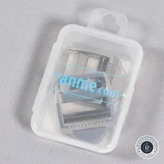 Blick in die geöffnete Verpackungsbox mit den beiden Nickel-Gurtverstellern und ByAnnie.com-Wasserzeichen