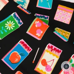 Detailaufnahme mit Gänseblümchen-, Orangen- und Kirschen-Motiven im Matchmaker-Design.