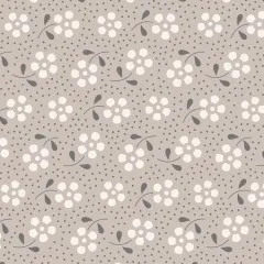Nahaufnahme des Streublümchenmusters mit kleinen weißen Blüten auf grauem Fond.