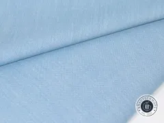 Detailaufnahme einer gefalteten Stoffecke des Blue-farbenen Chambray-Gewebes.