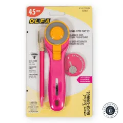OLFA Splash Quick-Change Rollschneider-Set 45mm in Pink mit Bastelmesser und Ersatzklingen, Frontalansicht der Verpackung.