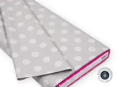 Gefalteter Stoffballen von Pom Pom in Fog mit Tula-Pink-Etikett am Stoffende