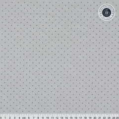 Kleine Punkte des Musters „Tiny Dots" in Fog (helles Grau in Grau), Lineal zum Größenvergleich.