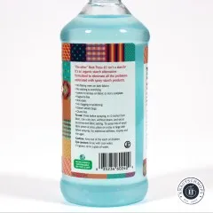 Rückseite des Etiketts mit Produkteigenschaften und Anwendungshinweisen zum Sprühen und Bügeln.