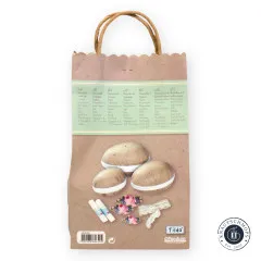 Rückseite der Verpackung mit mehrsprachiger Materialliste und Abbildung der unbemalten Pappmaché-Eier