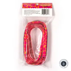 Rückseite der Verpackung mit Beschreibung 'zipper tape featuring pink pebbles on an orange background', Barcode und Sassafras-Lane-Logo.