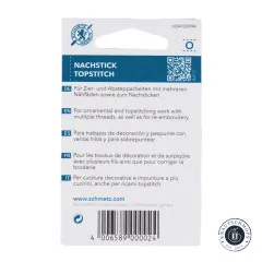 Rückseite der Schmetz Topstitch Verpackung mit mehrsprachigen Anwendungshinweisen und Barcode