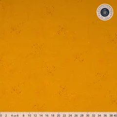 Senfgelber Baumwollstoff mit feinen roten Farbspritzern und Maßstab bis 40 cm