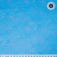 Großzügiger Musterausschnitt des Speckled-Stoffs in Chambray mit Zentimeter-Maßband zum Größenvergleich.