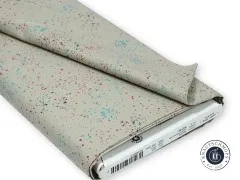 Gefalteter Stoffballen Ruby Star Society Speckled in Khaki mit Etikett und Marken-Webband.