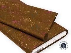 Gefalteter Stoffballen der Ruby Star Society Speckled-Kollektion in Metallic Cocoa mit Herstelleretikett am Rand.