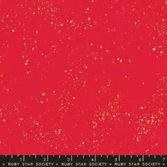 Offizielles Musterfoto „Speckled" in Scarlet mit aufgedrucktem Lineal und Ruby-Star-Society-Schriftzug.