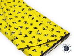 Stoffballen Spider Sense Citron mit gelbem Spinnenmuster und Ruby Star Society Banderole