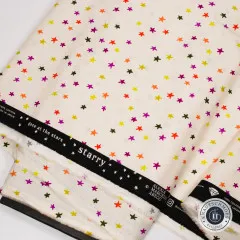 Stoffballen Ruby Star Society Starry mit schwarzer Webkante und Aufdruck gaze at the stars