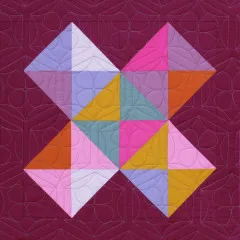 Quiltblock aus Halbquadrat-Dreiecken als Stern in Flieder, Pink, Gelb und Mint