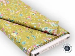 Gefalteter Stoffballen mit Etikett „Bloomsville 100520 Late Bloomer Corn".