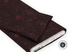Gefalteter Stoffballen der Speckled-Kollektion in Caviar mit Ruby-Star-Society-Etikett