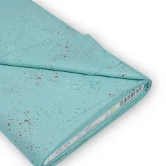 Gefalteter Stoffballen „Speckled" in Turquoise mit Ruby-Star-Society-Etikett (Kollektion, Designerin, Artikelnummer).