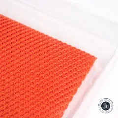 Gefaltetes Musterstück des ByAnnie's Lightweight Mesh in Pumpkin freigestellt ohne Verpackung.