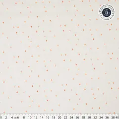 Gesamtansicht des Sternenmusters in Orange und Apricot auf Creme mit 40 cm Lineal