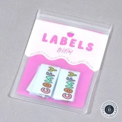 Verpackung der Kylie and The Machine Weblabels 'Comfy' in Babyblau mit buntem Schriftzug.
