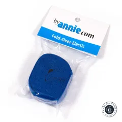 Fold-Over-Elastic Blastoff Blue in der Originalverpackung, schräg fotografiert mit gut lesbarem ByAnnie's-Etikett