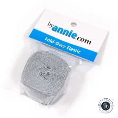 Fold-Over-Elastic Pewter in der Originalverpackung, schräg fotografiert mit gut lesbarem ByAnnie's-Etikett