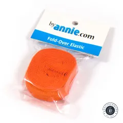 Fold-Over-Elastic Pumpkin in der Originalverpackung, schräg fotografiert mit gut lesbarem ByAnnie's-Etikett