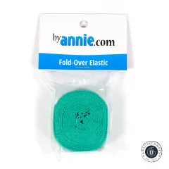 Verpackung des Fold-Over-Elastics in Türkis, gerade von vorne fotografiert