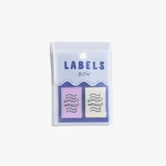 Verpackungskarte der „Perfectly Imperfect"-Labels freigestellt auf hellem Hintergrund.